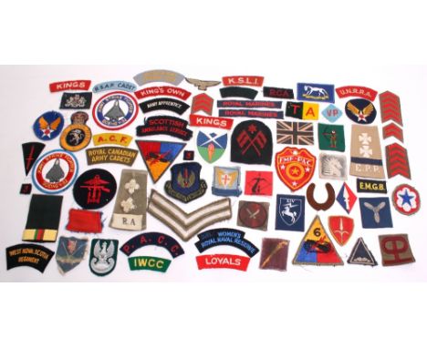 Selection of Cloth Insignia mostly British but some other nations also. Including The Kenya Police bullion blazer badge, Roya