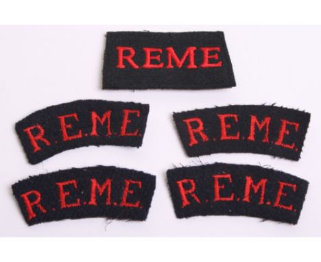 Scarce Early REME Shoulder Titles, being embroidered red on black, all show evidence of wear. Accompanied by an embroidered R