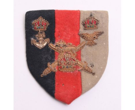 Fine Quality Supreme Headquarters India Cloth Formation Sign, having bullion wire insignia for the Army, Navy and Air Force o