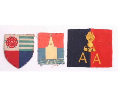 Three Army Group Royal Artillery (AGRA) Formation Signs consisting of embroidered 93rd, printed 96th and printed 100th. All r