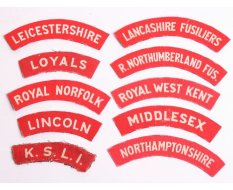 Selection of WW2 Printed Shoulder Titles consisting of R Northumberland Fus, Royal West Kent, Middlesex, Northamptonshire, Li