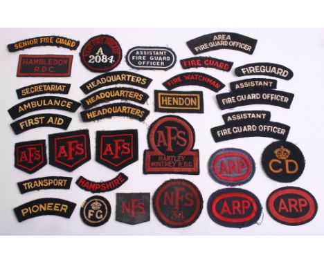 Selection of Civil Defence, ARP, AFS and NFS Insignia including two ARP overalls badges, painted ARP overall badge, printed N