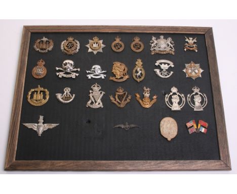 Selection of British Regimental Cap Badges of various regiments including The Essex regiment, Royal Engineers, The Devonshire