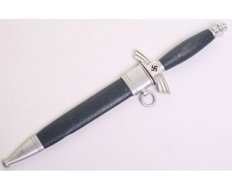 Third Reich NSFK Dress Dagger being an example with the later aluminium fittings. Blue leather covering to the handle and sca