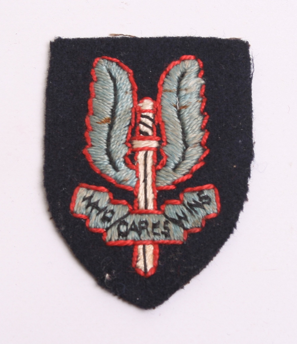 Scarce Late WW2 SAS (Special Air Service) Beret Badge being embroidered ...