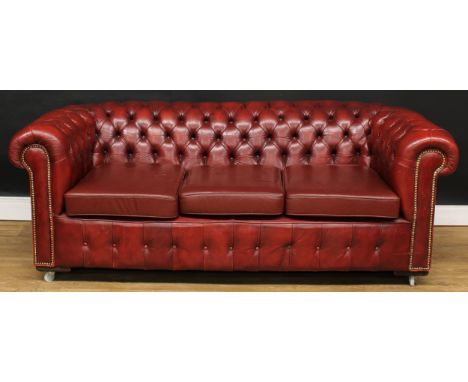 An office reception Chesterfield sofa, deep-button back, squab cushions, 74cm high, 200cm wide, the seat 146cm wide and 57cm 