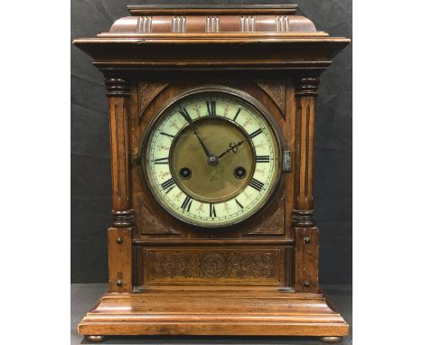 A German mahogany architectural bracket style mantel clock, ivorine chapter ring with Roman numerals, twin winding holes, pap