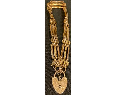 A 9ct rose gold gate link bracelet, 9ct gold love heart clasp, marked 375, 13g, c.1900, boxed 