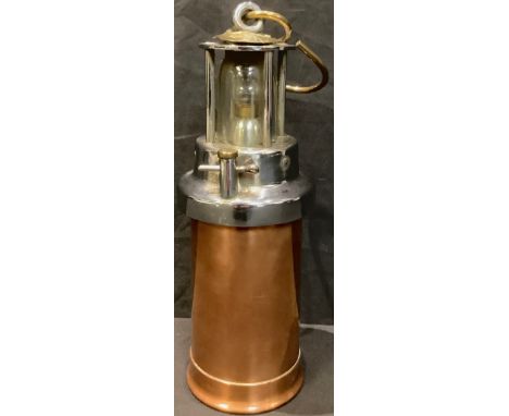 A copper CEAG patent miners lamp with 99D pit check 