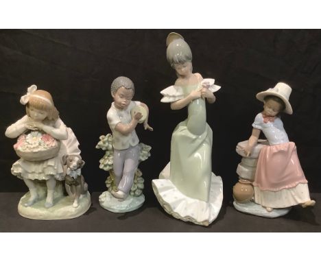 A Lladro figure, A Step In Time; others, Bongo Beat and Girl With Flowers; a Nao figure, Spanish Girl (4) 