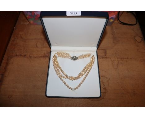 A cultured pearl necklace