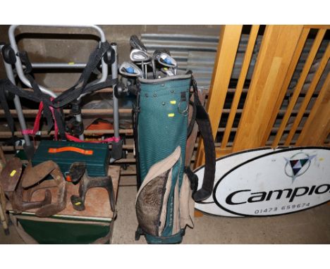A Dunlop golf bag and clubs