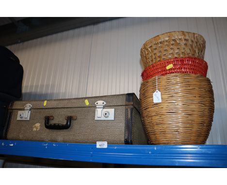 A vintage suitcase together with three small baskets