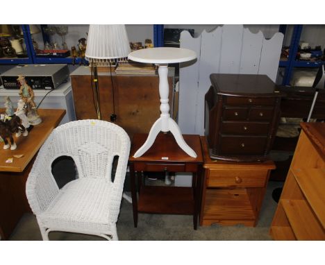 A pine two tier bedside table; a mahogany similar; a unit with four drawers and magazine rack; a white painted occasional tab