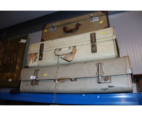 Three vintage suitcases together with a satchel