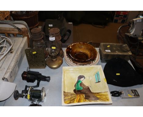 Two Tilley lamps, an oil lamp, pair of brass bookends, pottery dish, cloud glass dish, and Myette plates