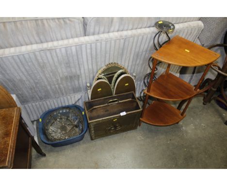 A three tier corner stand, triptych mirror, brass embossed magazine rack, wrought iron candle stand and a light fitting