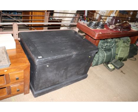 A large carpenter's tool chest with fitted interior and various tools 