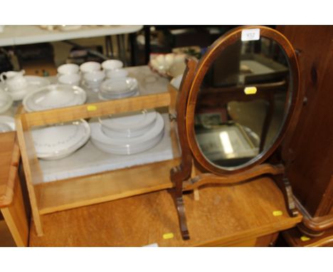 A mahogany and box wood strung swing toilet mirror and a light oak book trough