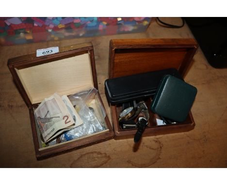 Two wooden trinket boxes containing various coinage, bank notes, wrist watch, Parker pen, 50th Anniversary commemorative coin