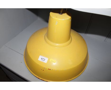 A vintage enamel ceiling light 