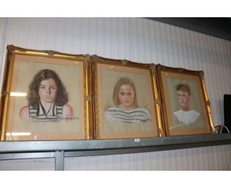 S Homer, gilt framed portrait study of a boy together with two other gilt framed portraits studies of girls