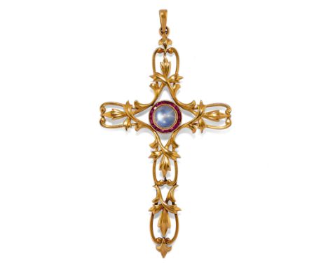 modelè comme un crucifix à dècor de volute vègètale, au centre une pierre de lune cabochon entourèe de rubis synthètiques cal