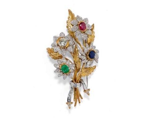 en forme de bouquet de fleurs ornè de rubis, d'èmeraude, de saphir ovale et de diamants, poinçon 750Poids 34,00 g environA TW
