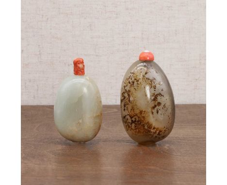 Two Chinese snuff bottles, Qing dynasty (1644-1911), one jade and the other agate, plain, both with a coral stopper, 6.5 and 