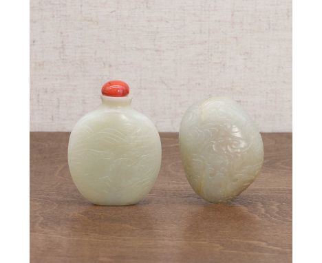 Two Chinese jade snuff bottles, Qing dynasty (1644-1911), comprising:one of compressed form, carved with a landscape, 5cm hig
