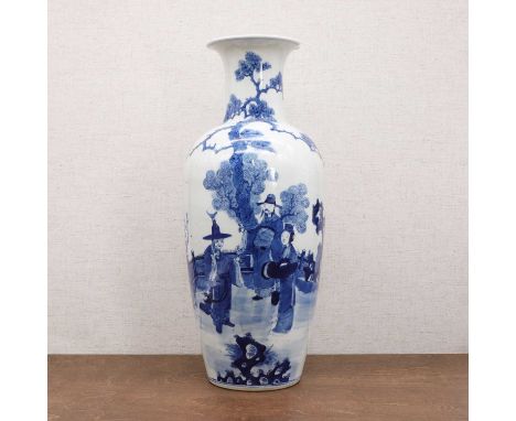 A Chinese blue and white vase, Guangxu (1875-1908), of tapering form, painted with figures in a garden, with a four-character