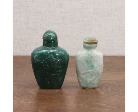 Two Chinese snuff bottles, 20th century, comprising:one jade, the compressed tapering body carved with a rabbit and the moon 