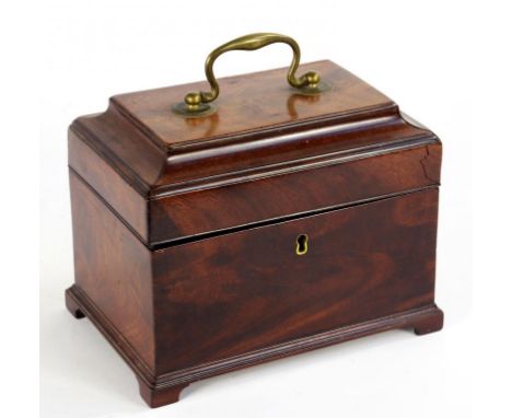 A GEORGE III MAHOGANY TEA CADDY WITH CAVETTO LID, THE FITTED INTERIOR INLAID IN BARBER POLE STRINGING AND RETAINING TWO COMPA