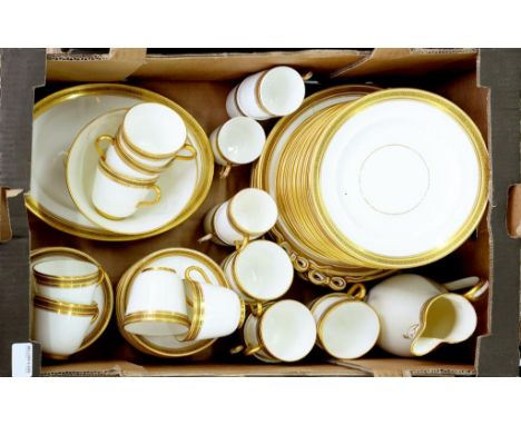 A BONE CHINA TEA SERVICE WITH BLACK AND GILT GREEK KEY BORDER