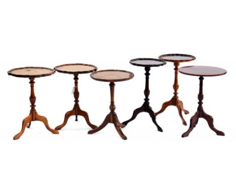 A PAIR OF WALNUT TRIPOD TABLES AND FOUR OTHERS SIMILAR