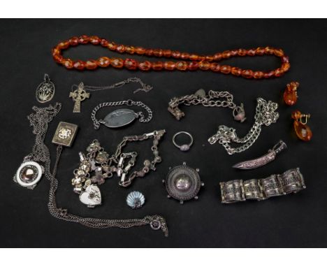 A collection of costume jewellery, including; a silver bracelet, a bracelet with a tag, a charm bracelet, a necklace in a fol