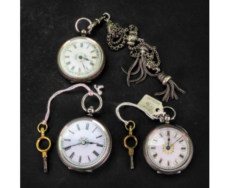 A key wind, open faced pocket watch, the white enamel dial with black Roman numerals and decorated with a floral design, the 