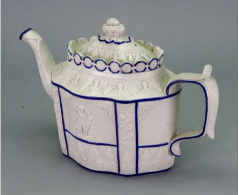 A Castleford white Feldspathic teapot, circa 1815, moulded with cherubs and acanthus leaves, 24cm across.