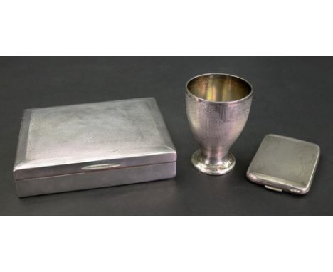 A rectangular silver cigarette box, Birmingham 1937, with hinged engine turned cover, 11 x 8.5cm, an engine turned silver boo