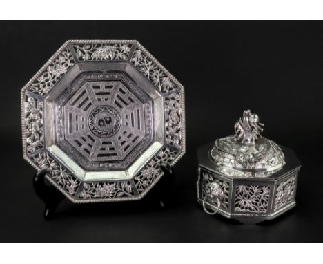 A Chinese silver octagonal stand, Yung Lei, Shanghai, circa 1900, having a beaded rim, the border pierced and embossed with p