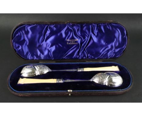 A cased pair of large late Victorian silver salad servers, Harrison Brothers &amp; Howson, Sheffield 1896, engraved with leaf