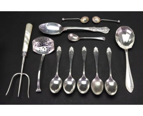 A silver three prong bread fork, Sheffield 1924, with mother of pearl handle, a set of five silver coffee spoons, Sheffield 1