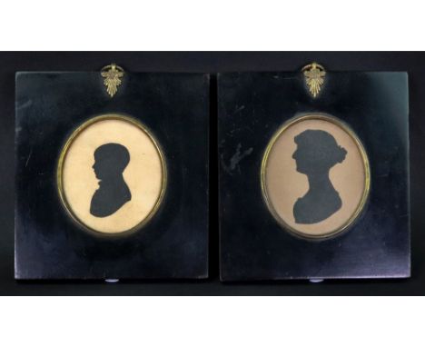 A portrait miniature silhouette of William Oke Manning (1808-1878), 7.5 x 6cm, together with another of a lady, 7.5 x 6.5cm (