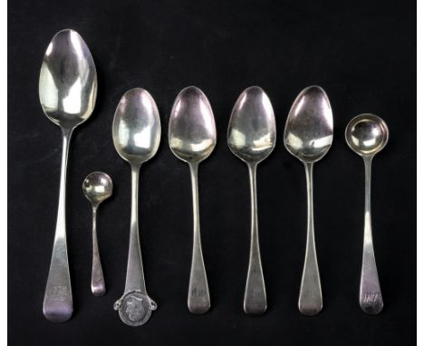 A George IV silver Old English pattern dessert spoon, London 1826, three similar teaspoons, London 1851, a similar cream ladl