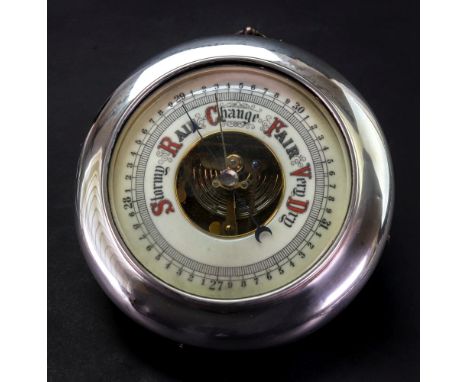An Edwardian silver mounted mahogany cased barometer, hallmarked for H. Matthews, Birmingham 1908, with cream dial, gilt meta