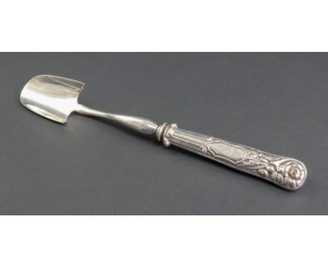 A George IV silver stilton cheese scoop, R. Mitchell, Birmingham 1824, the handle foliate embossed around two cartouches, one