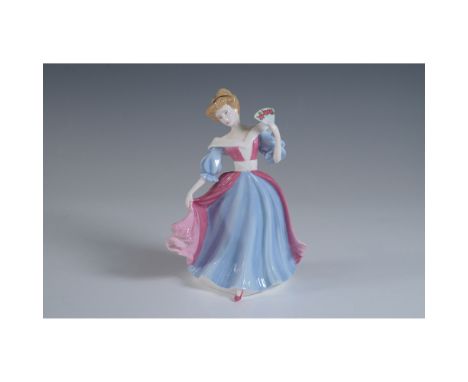 This delightful Royal Doulton figurine, titled Amy, is part of the Pretty Ladies collection and was named Petite of the Year 