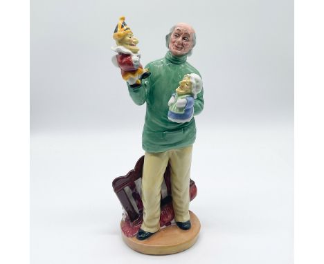 This Royal Doulton porcelain figurine, titled "Punch and Judy Man" (HN2765), was designed by William K. Harper. It portrays a
