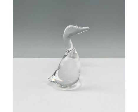 A stunning crystal glass duck figurine by Steuben. Renowned for its clarity and elegance, this piece showcases the superior c