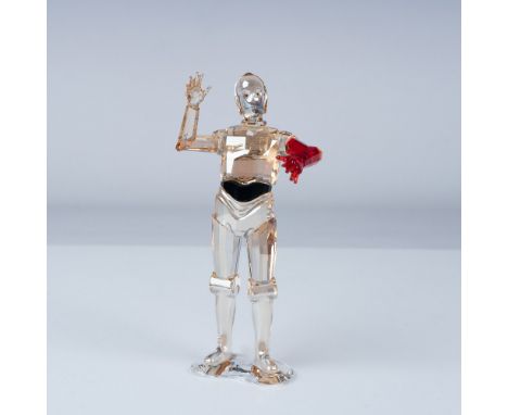 Presenting an exquisite Swarovski crystal figurine of C-3PO, the iconic protocol droid from the Star Wars universe. This meti